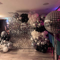 Luxury Silver Mirror Wall Backdrop with Black & Chrome Balloon Garland